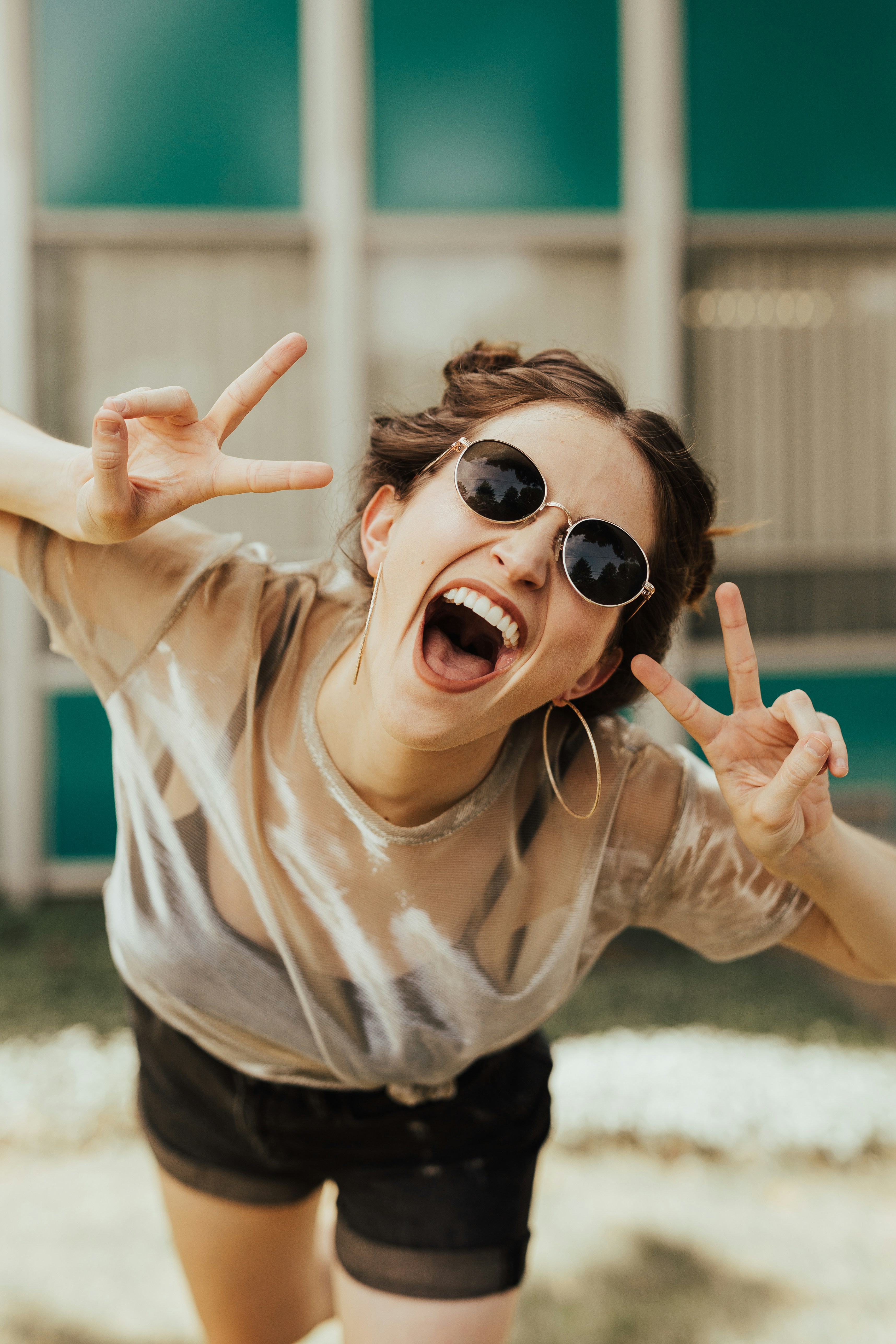 Happy woman smiling warmly in sunlight